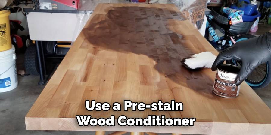 Use a Pre-stain 
Wood Conditioner