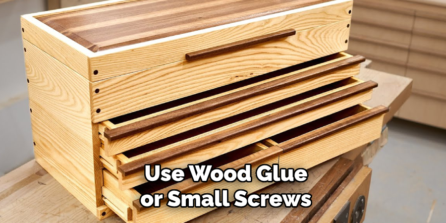 Use Wood Glue or Small Screws