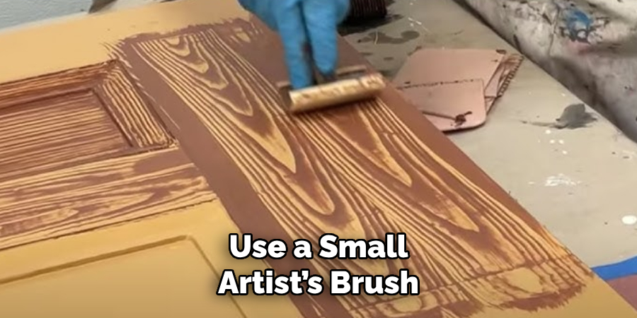 Use a Small Artist’s Brush