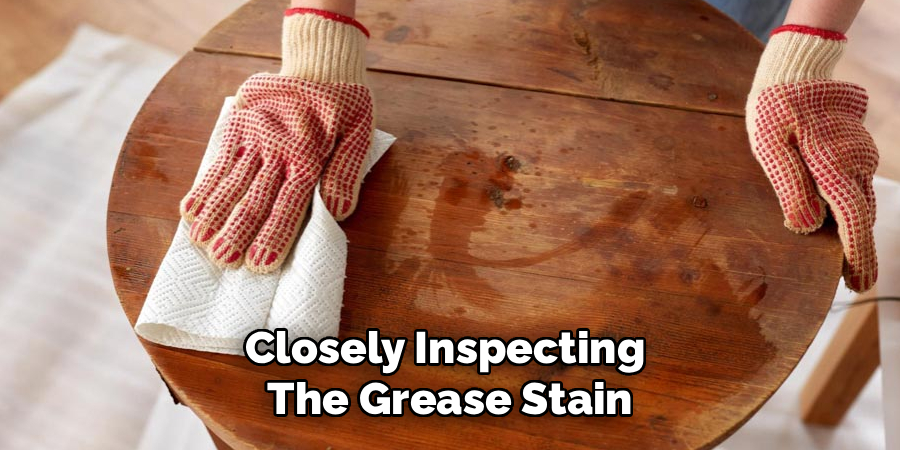 Closely Inspecting
The Grease Stain