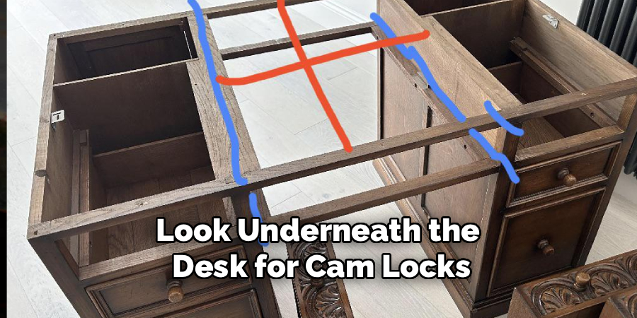 Look Underneath the
 Desk for Cam Locks